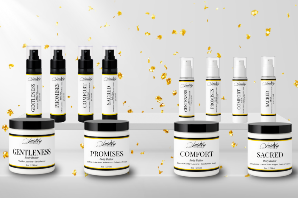 Collection of body butter jars and bottles with labels on a light gray background